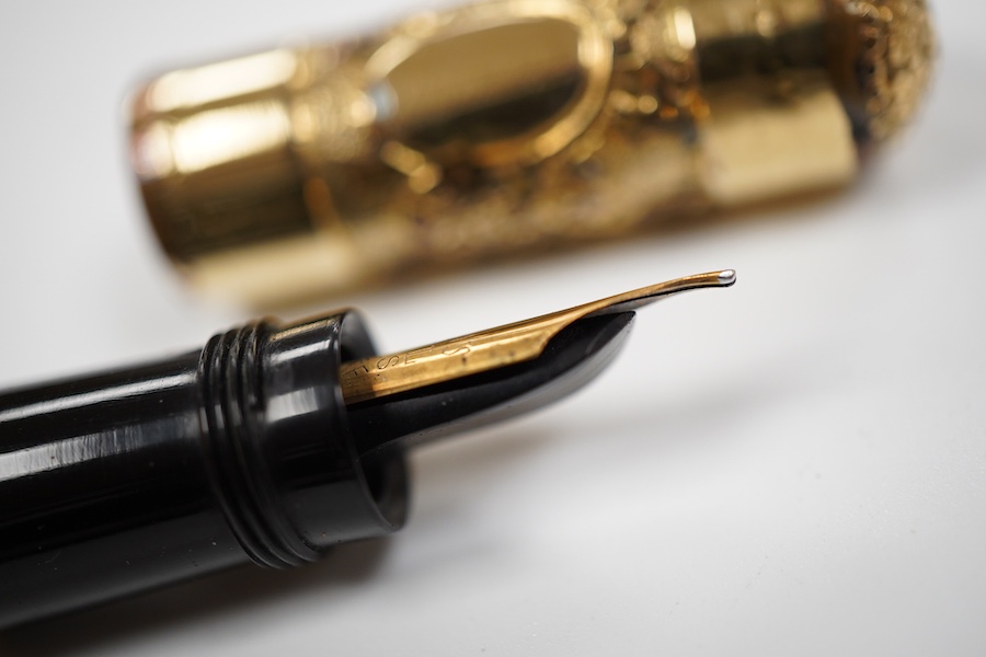 A Waterman No.42 'continental' safety with un unusual highly decorated cap top depicting female faces